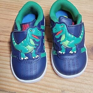 K-Swiss Dinosaur shoes. Toddler size 5 NWOT